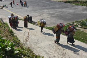 Women carrying medicine